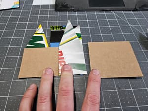 A first draft of a foldable building, made a soda box.