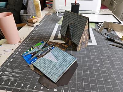 The same refined foldable building, now folded flat.