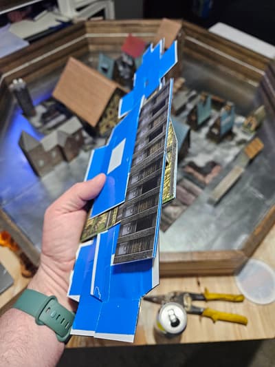 A different foldable building with magnetic closures, shown folded.